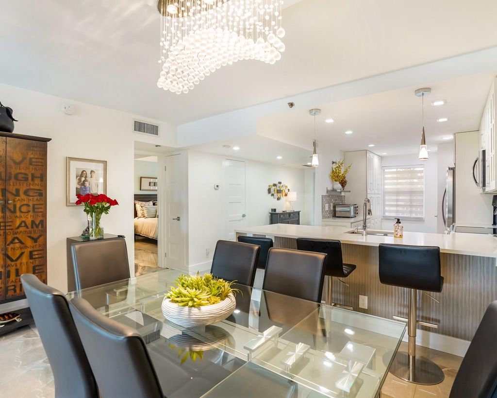 Photo of 3510 Oaks Way #306, Pompano Beach, FL 33069 (MLS # F10540193)