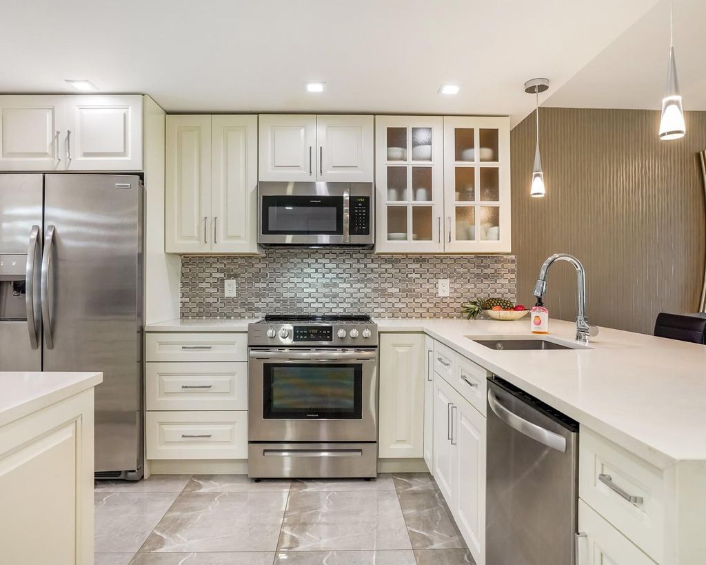 Photo of 3510 Oaks Way #306, Pompano Beach, FL 33069 (MLS # F10540193)