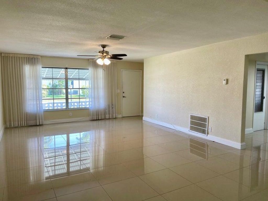 Photo of 1103 SW 3rd Avenue, Boynton Beach, FL 33426 (MLS # R11002085)