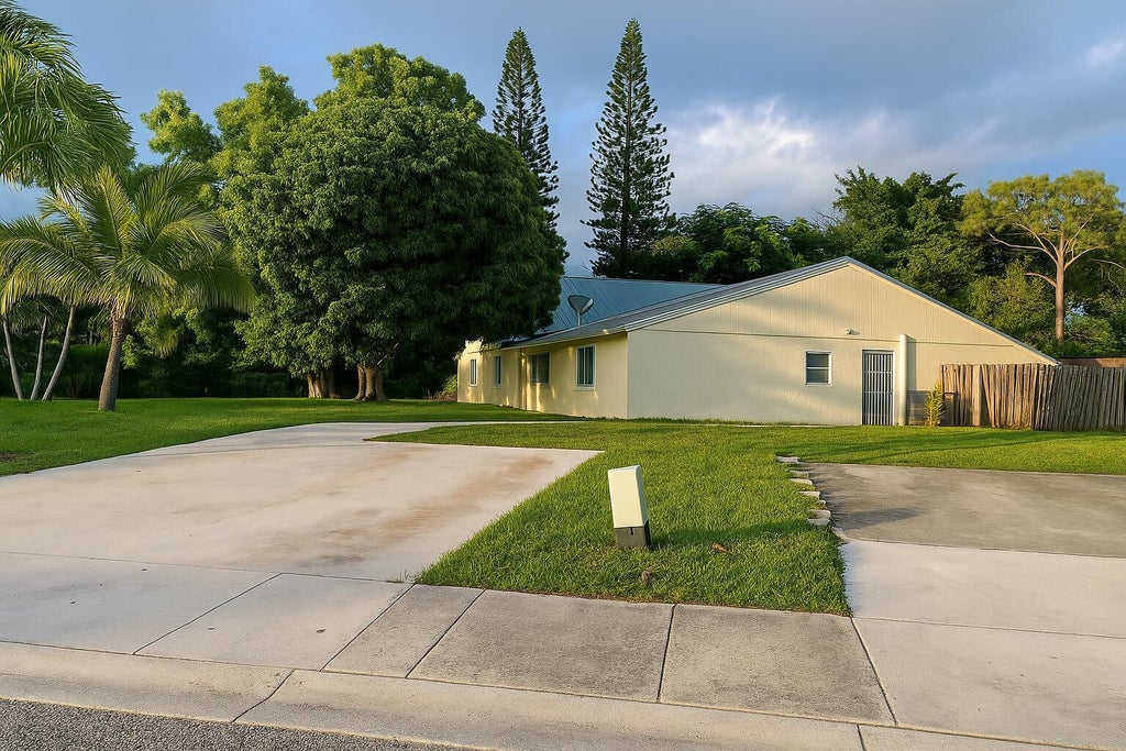 Photo of 4495 NW 3rd Drive, Delray Beach, FL 33445 (MLS # R11130080)