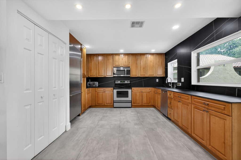 Photo of 1230 NW 22nd Avenue, Delray Beach, FL 33445 (MLS # B26038924)