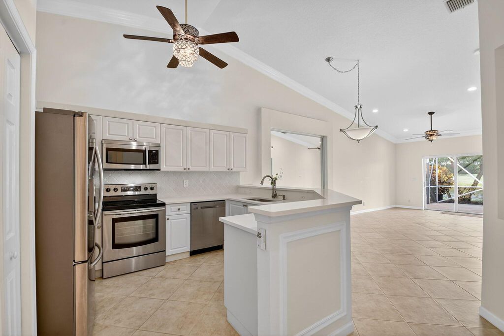 Photo of 9871 Galleon Drive, West Palm Beach, FL 33411 (MLS # R11129071)