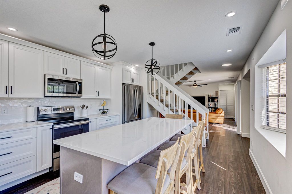 Photo of 365 Prestwick Circle #2, Palm Beach Gardens, FL 33418 (MLS # R10899953)