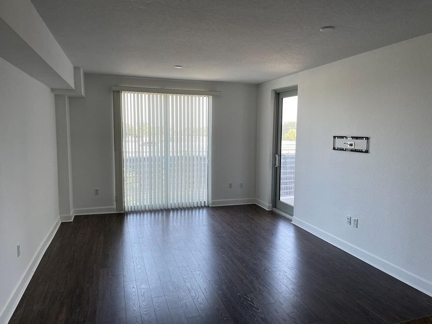Live in the heart of Downtown Hollywood at the highly sought-after Radius Condo. This stylish 2-bedroom, 2-bathroom residence offers 1,036 sq ft of modern living with newer appliances, updated flooring throughout, granite countertops, and an in-unit washer and dryer. The open-concept layout flows seamlessly to your private balcony overlooking the vibrant city streetscape — the perfect backdrop for your morning coffee or evening wind-down. Radius delivers true resort-style living with an impressive suite of amenities including a rooftop pool with panoramic views, fitness center, sauna, spa, yoga room, movie theater, business center, and 24-hour concierge and valet. One assigned covered parking space included. Live in the heart of Downtown Hollywood