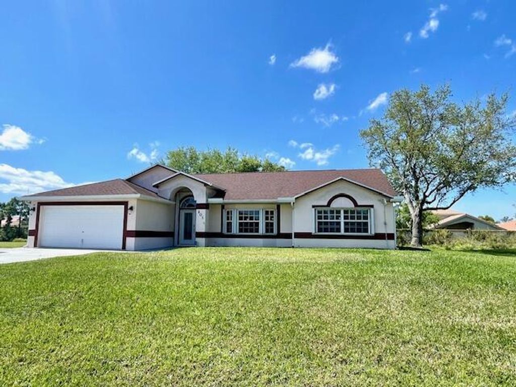 Photo of 201 Sandalwood Drive, Fort Pierce, FL 34947 (MLS # R10973832)