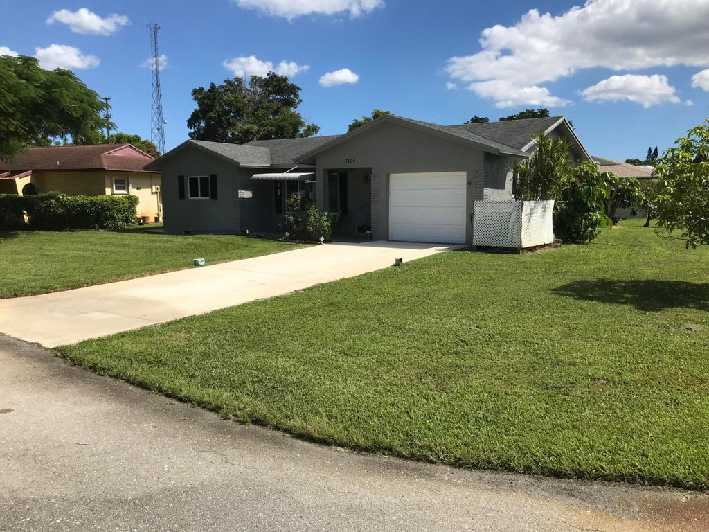 Photo of 7104 NW 92ND Terrace, Tamarac, FL 33321 (MLS # B26093648)