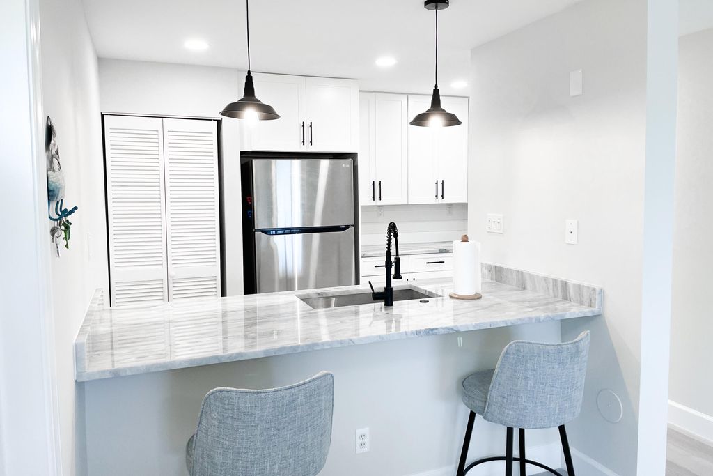 Photo of 1550 S Ocean Drive #19, Hutchinson Island, FL 34949 (MLS # R11109910)