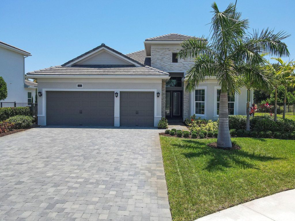 Photo of 2565 NE Evinrude Circle, Jensen Beach, FL 34957 (MLS # R10992759)