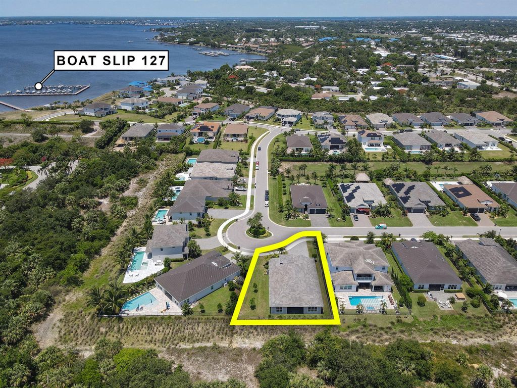 Photo of 2565 NE Evinrude Circle, Jensen Beach, FL 34957 (MLS # R10992759)