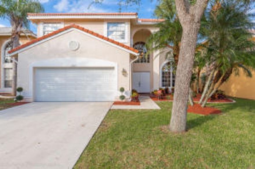 PRICE TO SELL! Wake up to a magnificent Lake view, stroll into your EnSuite which features a 7 headed luxury shower.  Completely renovated single family home in a quiet neighborhood, sought after Lakes of Boca. 3 bed, 2.5 bathrooms, 2 car garage on a great private lot. Plenty room for a pool. Shows like a model. New garage door, Granite kitchen, upgraded cabinets, Real wood floors & high vaulted ceiling makes this home your buyers dream. Amazing custom shades in MB. Stainless steel matching appliances. Tinted windows great for privacy and energy efficiency. A/C replaced 2012. Bonus storage under stairs. Design touches throughout.