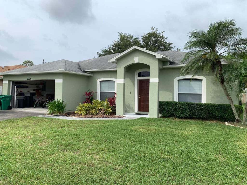 Photo of 2726 SW District Avenue, Port St Lucie, FL 34953 (MLS # R10917531)