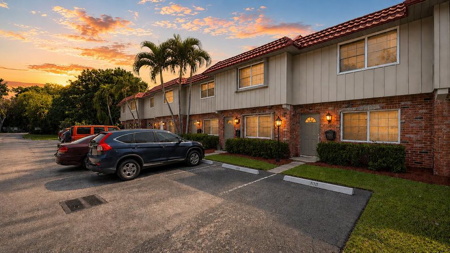 Opportunity awaits in the heart of Wilton Manors. This 2-bedroom, 1.5-bath townhouse features brand new full hurricane impact windows and doors throughout, a newer AC system, newer appliances, a new fence, fresh interior paint, and an in-unit washer and dryer. Recently updated units in this same community have sold in the mid-$300s, offering great potential for value appreciation with the right upgrades and making this the perfect opportunity for the savvy buyer or investor looking to remodel and make it their own. The layout is comfortable and functional. The main level features an open living and dining area, a half bath with a large closet perfect for storage, and direct access to a private fenced patio ideal for outdoor dining or a quiet retreat. Upstairs you will find two generously sized bedrooms with ample closets and a full bath. What truly sets Manor Grove apart are its spectacular natural green spaces, creating a serene, pet-friendly environment with incredible outdoor areas to roam and explore within the secure, beautifully maintained community. Residents can have up to two dogs with no weight or breed restrictions, and the location is hard to beat. Seven-minute walk to Wilton Drive, minutes to downtown Fort Lauderdale, and less than 4 miles to the beach. One assigned parking space plus guest parking. Water, sewer, trash, and roof repairs are all included in the monthly HOA fee.  This light and inviting home is ready for your personal touch. Whether you are an investor looking for strong upside or a savvy buyer ready to build equity in one of South Florida's most desirable cities, this is the opportunity you have been waiting for.