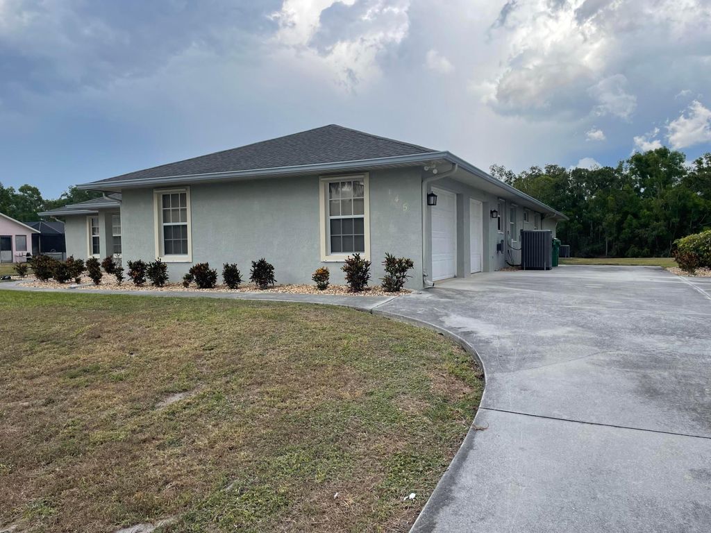 Photo of 145 SW Hawthorne Circle, Port Saint Lucie, FL 34953 (MLS # R11089345)