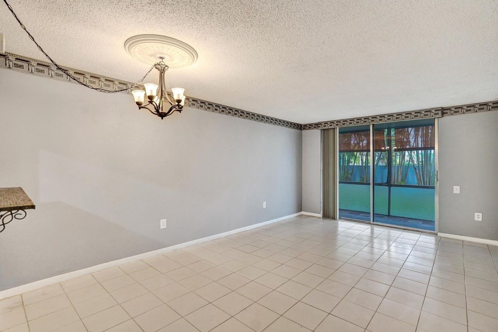 Photo of 9201 Lime Bay Blvd #114, Tamarac, FL 33321 (MLS # F10532200)