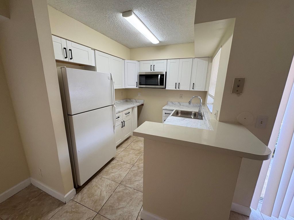 Photo of 7610 Westwood Drive #106, Tamarac, FL 33321 (MLS # B26012756)