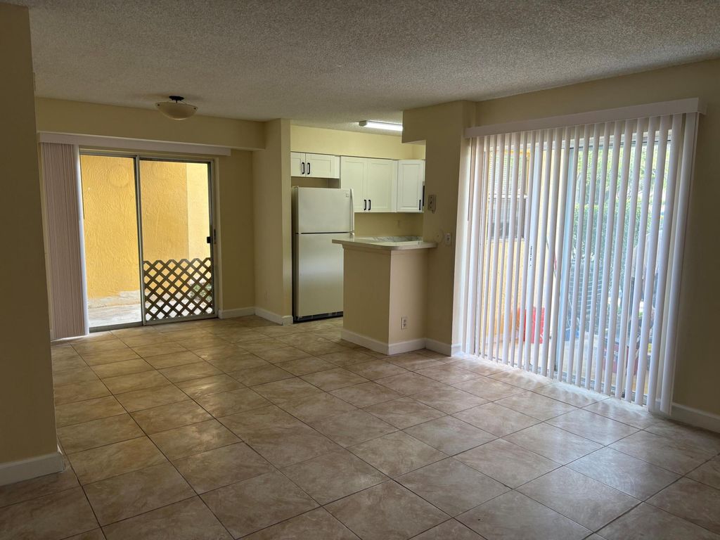 Photo of 7610 Westwood Drive #106, Tamarac, FL 33321 (MLS # B26012756)
