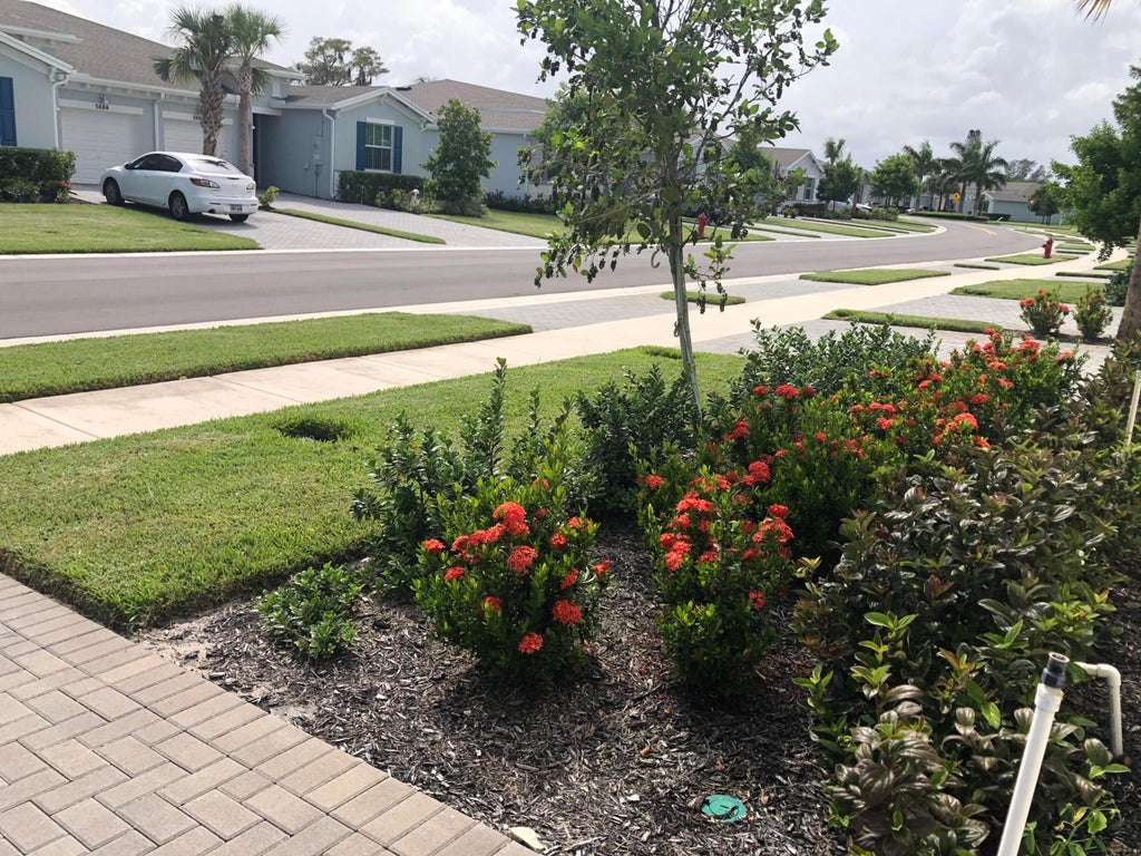 Photo of 5665 DIVINE Drive, Delray Beach, FL 33484 (MLS # B26080120)
