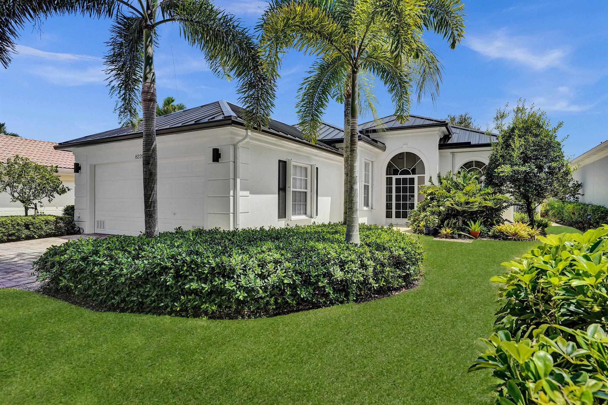 Welcome to 8228 Rosalie Lane in Wellington's VillageWalk gated community. This 3-bed, 3-bath, 2-car garage DiVosta home with solid poured concrete construction includes a convertible room ideal as a 4th bedroom. Fully remodeled, it boasts an open floor plan, luxury wood-look flooring, a gourmet kitchen, spa-like bathrooms, new lighting, and a freshly painted exterior with a hurricane-rated metal roof and seamless gutters. Offered fully furnished with a full-price offer, it's move-in ready. VillageWalk features 6 miles of trails, 93 acres of parks, 112 acres of lakes for fishing, and a wildlife preserve, plus resort-style pools, tennis, pickleball, gym, and eventsa"all near top schools, shopping, dining, beaches, and Palm Beach International Airport. Schedule your private tour today!