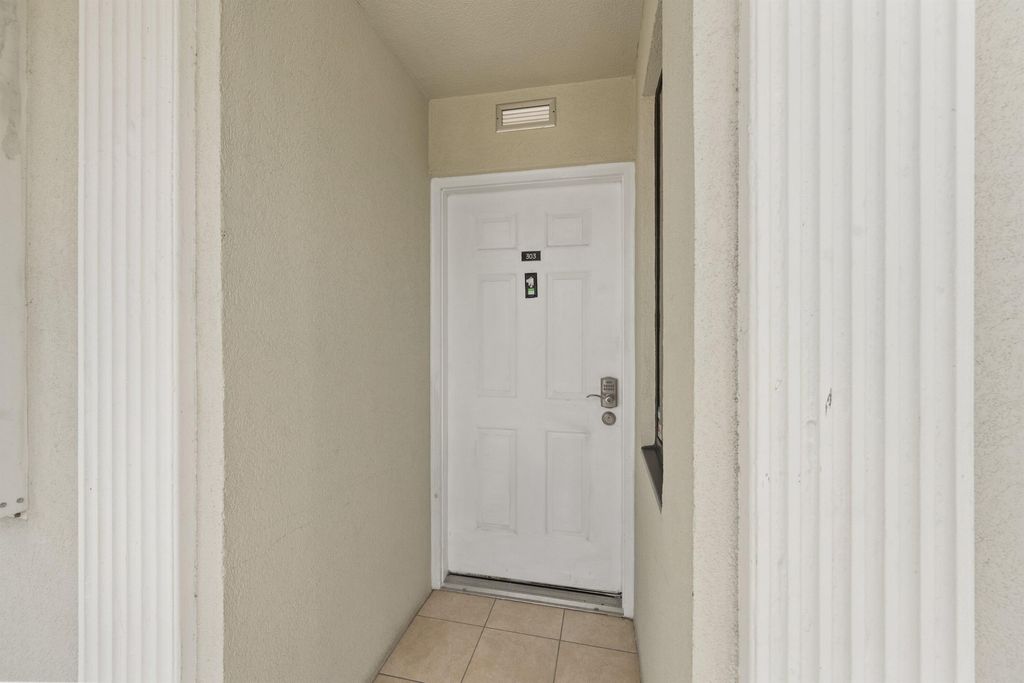 Photo of 2741 Village Boulevard #303, West Palm Beach, FL 33409 (MLS # B26002190)