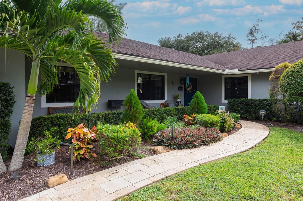 Photo of 6038 NW 63rd Way, Parkland, FL 33067 (MLS # R10939008)
