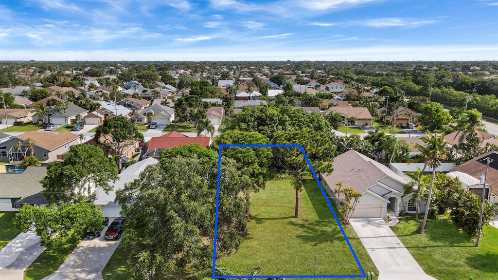 RARE single family in-town lot to build your DREAM home or hold as investment. Desirable east side of NPB Heights. No HOA to restrict your vision. May be purchased alone or with adjacent single family residence (6071 Drake Street). Community has local park with occasional live music, food trucks etc. and is known for its holiday decorations. Close to both downtown Abacoa and new Alton Town Center with restaurants, shopping and entertainment, including Roger Dean Baseball stadium. Blocks away from Scripts, Max Plank and a quick drive to I95 for an easy commute.