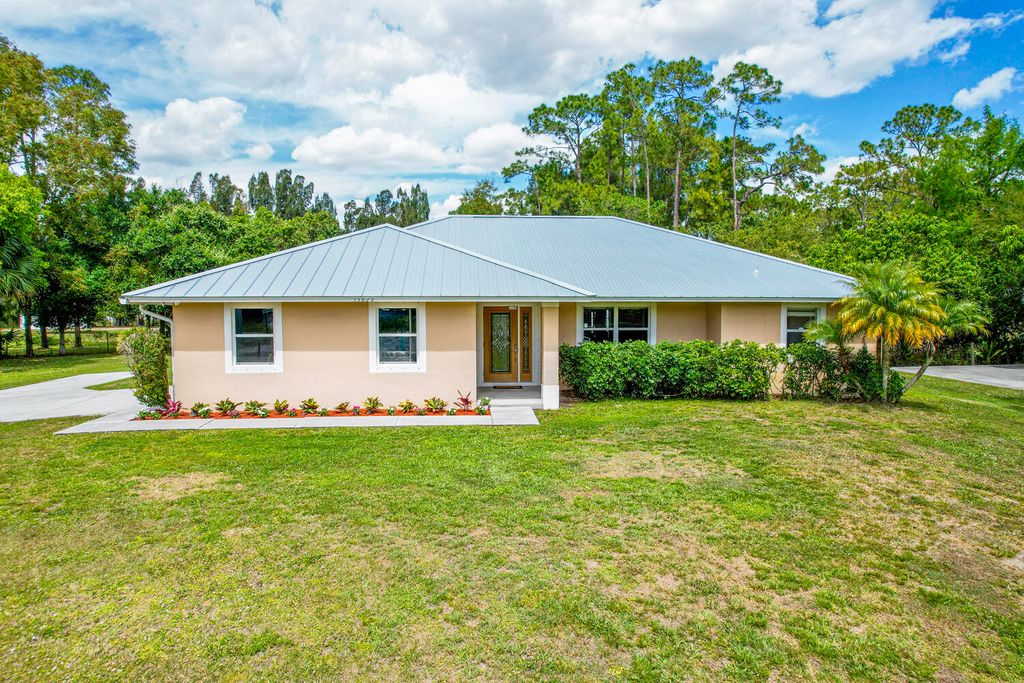Photo of 15829 133rd Terrace N, Jupiter, FL 33478 (MLS # R10954623)