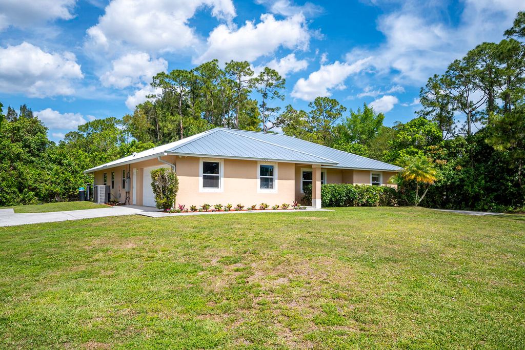 Photo of 15829 133rd Terrace N, Jupiter, FL 33478 (MLS # R10954623)