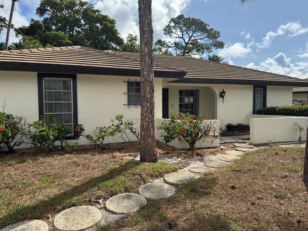 Photo of 433 Pine Villa Drive, Atlantis, FL 33462 (MLS # R11102775)