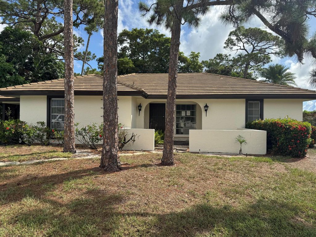 Photo of 433 Pine Villa Drive, Atlantis, FL 33462 (MLS # R11102775)