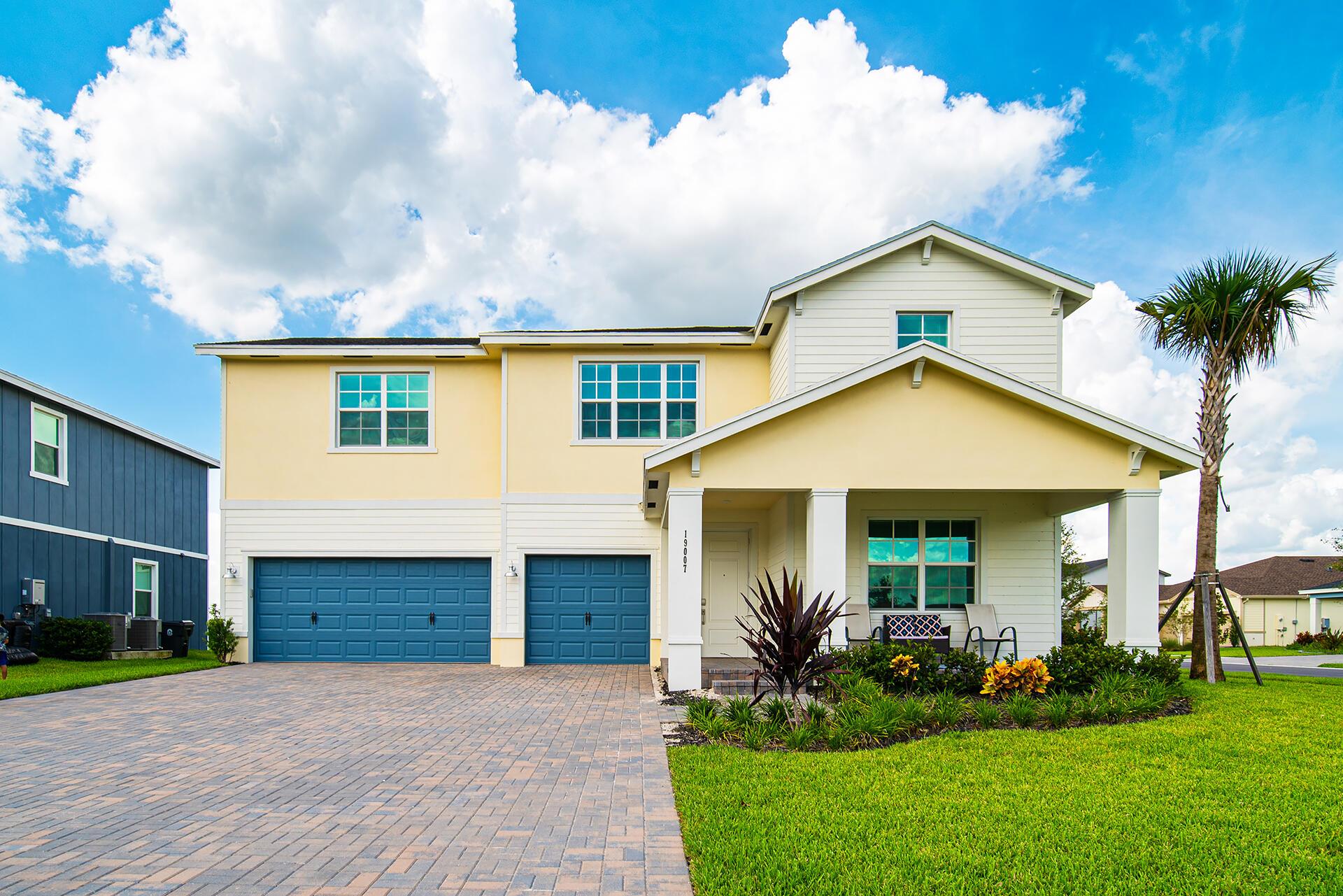 Come take a look at this impressive Holly model, which features 5 bedrooms, a den/office, 3.5 bathrooms, upgraded features, hurricane impact windows, a 3-car garage, and a 9-vehicle driveway. The home also boasts a gourmet kitchen, quartz countertops, and an extended island, perfect for hosting guests. Welcome to the Agrihood, where homes offer a lifestyle, not just a place to live. It seamlessly blends modern convenience with the tranquility of nature, providing a unique living experience. Residents enjoy vast green spaces, serene lakes, and beautifully landscaped parks. Arden is not just a community; it's an invitation to relish the unique pleasures of life in Florida. The community offers resort-style amenities, including a clubhouse with an outdoor patio, a lakehouse with a
