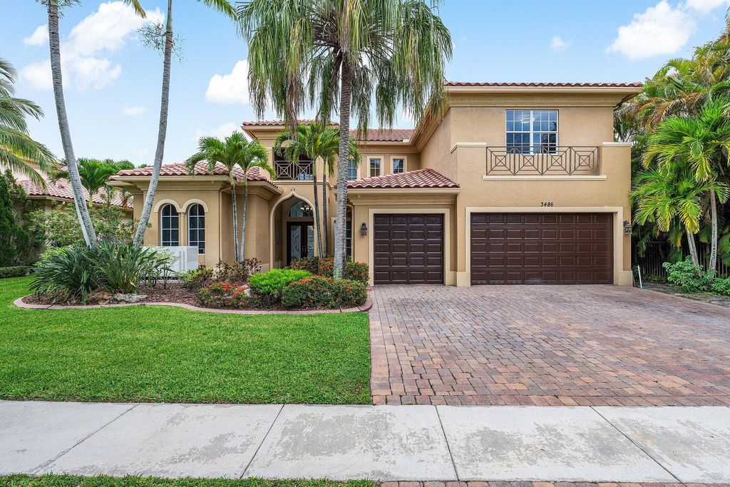 Photo of 3486 Lago De Talavera, Lake Worth, FL 33467 (MLS # B26017433)