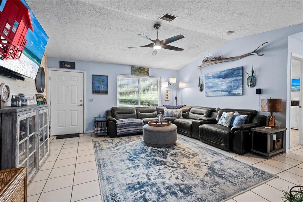 Photo of 3095 SE Ellendale Street, Stuart, FL 34997 (MLS # R10983596)