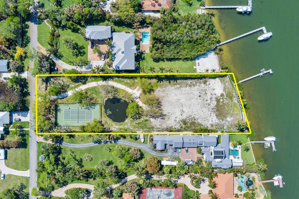 Photo of 5559 Pennock Point Rd, Jupiter, FL 33458 (MLS # B26009285)