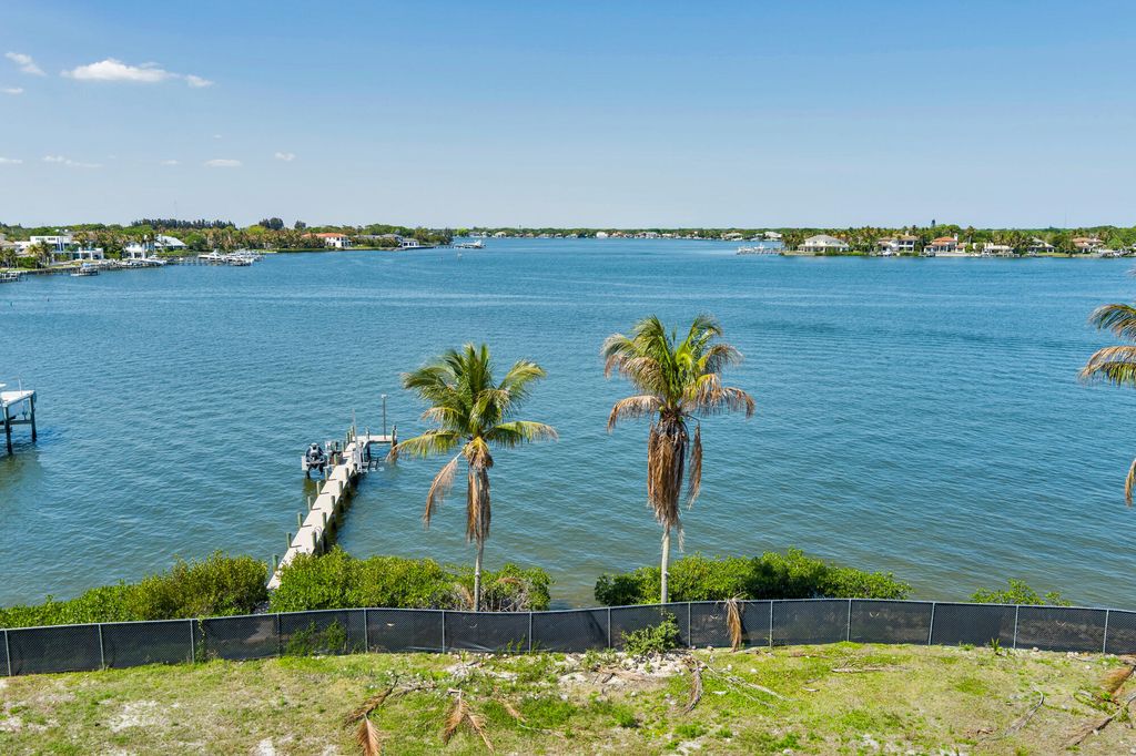 Photo of 5559 Pennock Point Rd, Jupiter, FL 33458 (MLS # B26009285)