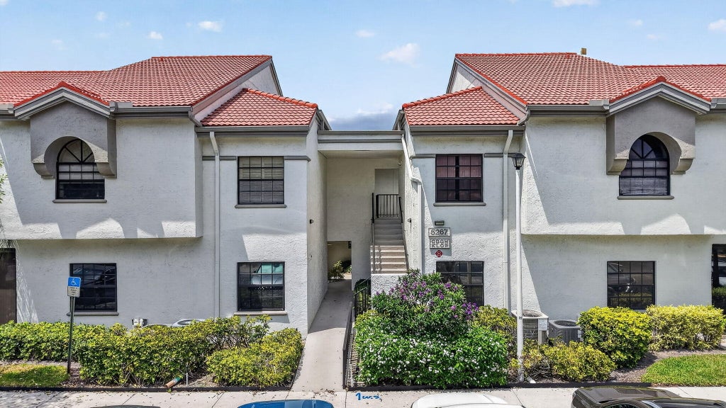 Photo of 5267 Europa Drive #C, Boynton Beach, FL 33437 (MLS # B26069819)