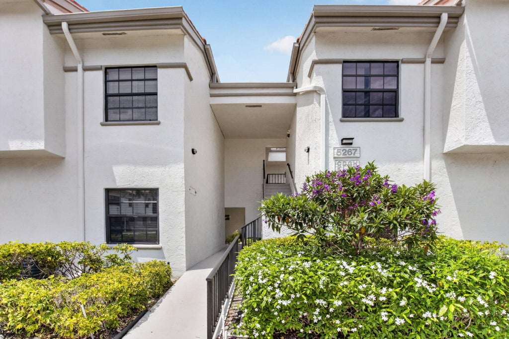 Photo of 5267 Europa Drive #C, Boynton Beach, FL 33437 (MLS # B26069819)