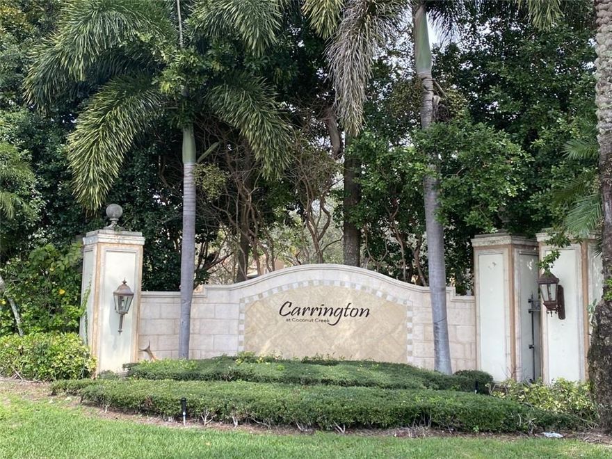Enjoy resort style living in this 2 Bed/2 Bath top floor condo, which has a private balcony with lake views, vaulted ceilings, rare find with garage plus assigned parking just steps away. Located in a lush gated community offering ultimate amenities including tennis, pool, jacuzzi, racquetball court, exercise room, children play center, meeting rooms and valet trash removal from your doorstep!  The unit has new hot water heater, dishwasher, washing machine AC is approx. 4 years old.  The Carrington is conveniently located near dining, shopping, the Promenade at Coconut Creek, and the Sawgrass Expressway. Unit can be rented. Bring your paint brush and vision to make this your home.