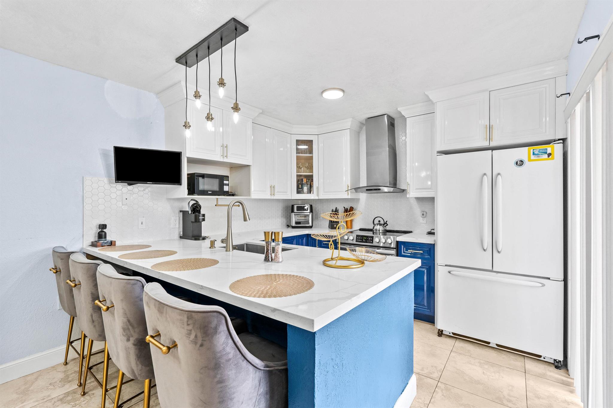 Welcome to your dream 2 story townhome with 2 bedrooms and 2.5 baths with a lakeview. Fully upgraded 2023 kitchen with stainless steel appliances, quartz countertops, custom white and blue cabinets, 2023 roof, 2022 A/C. New fans and light features. New A/C was installed in 2020 and all A/C ducts were cleaned in 2022. Monthly payment includes water, basic cable, internet. There are several pools, playground, walking trails, tennis and basketball courts in the community.