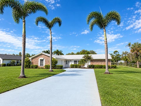 Photo of 2156 SE HARLOW Street, Port Saint Lucie, FL 34952 (MLS # B26077928)
