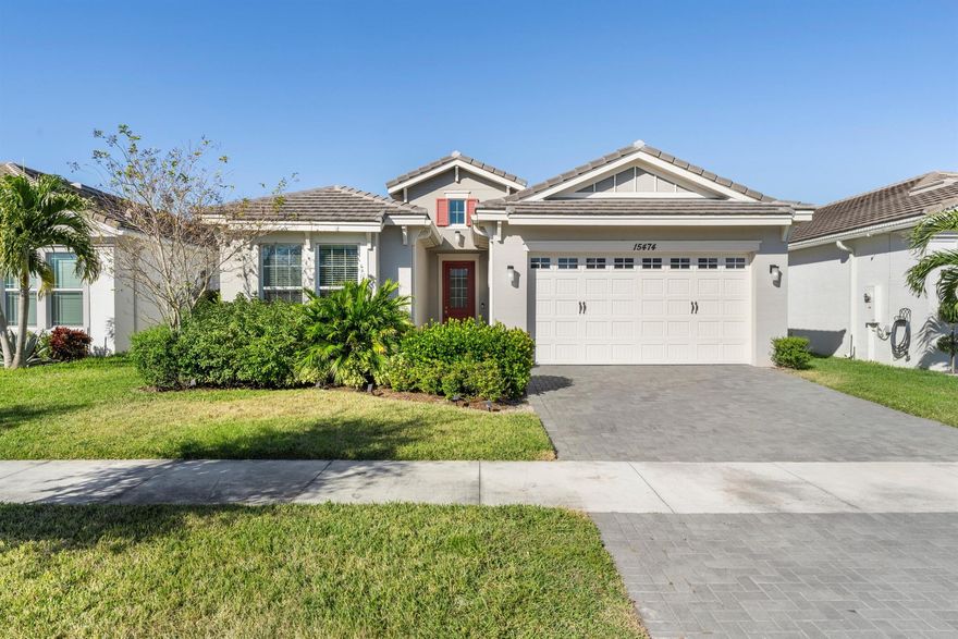 Welcome to this inviting newer home, offering 3 bedrooms, 2 bathrooms, and a 2-car garage. This home features impact windows and tile flooring throughout, combining style and durability. Enjoy the spacious kitchen, complete with granite countertops, stainless steel appliances, and plenty of cabinet space. The primary suite offers a peaceful retreat with a large walk-in closet, double sinks, and a private toilet room. Step outside to enjoy the screened-in patio, custom pool, and fully equipped summer kitchen -- perfect for entertaining or relaxing in your own backyard oasis. Located in the vibrant community of Westlake, you'll be close to parks, shopping, dining, and top-rated schools. This beautiful home is ready for you to move in and start making memories!