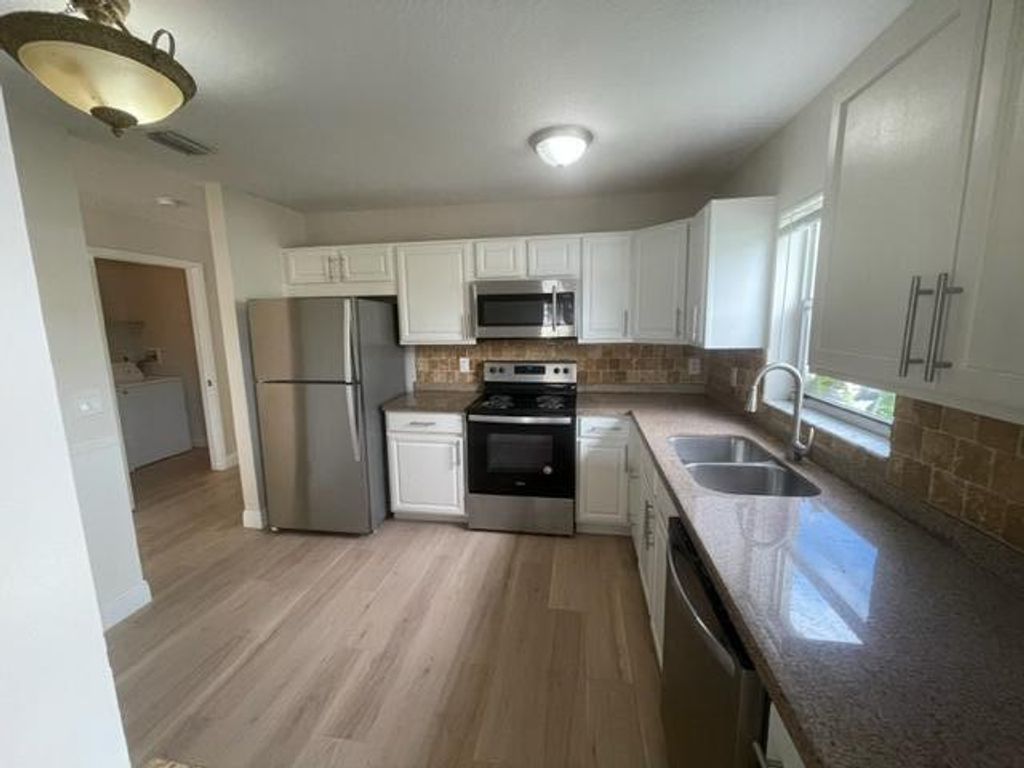 Photo of 22870 SW 13th Place #D, Boca Raton, FL 33428 (MLS # R11087005)