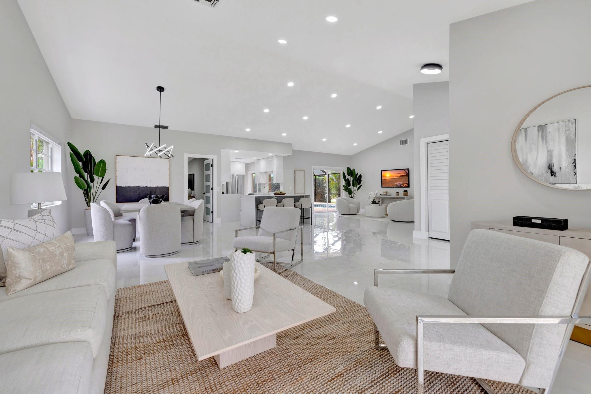 Fully Renovated & Move-In Ready in Prime Weston Location! Stunning 4-bed, 3 bath home, thoughtfully updated from top to bottom - 2025 roof, new electrical panel, and custom finishes throughout. Step inside to extra-large porcelain tile floors that flow through a spacious open layout - ideal for modern living. The chef-style kitchen, featuring new quartz countertops, an oversized island, and SS appliances create a dream setup for cooking and gatherings. Four generously sized bedrooms, including a luxurious primary site with custom built-in closets and a spa-inspired bath. Private pool and screened patio - perfect for entertaining and relaxing in Florida sun. No HOA fee. Zoned for Weston’s top-rated schools. Style, comfort, and peace of mind.