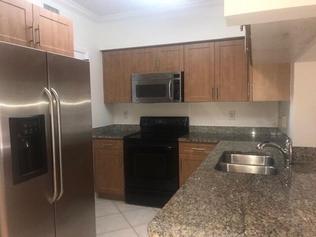 Photo of 6410 Emerald Dunes Drive #205, West Palm Beach, FL 33411 (MLS # B26004773)