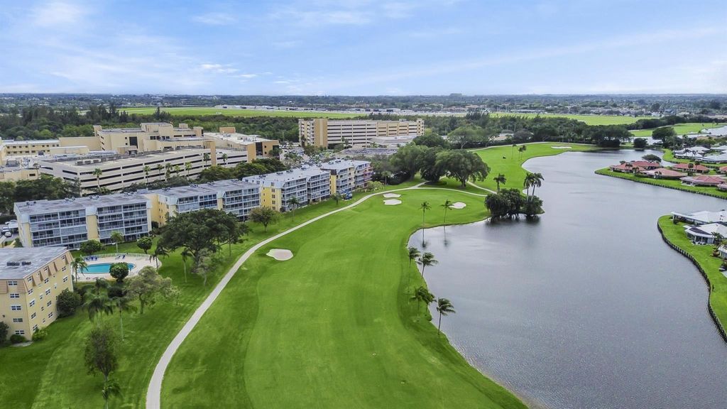 Photo of 250 John F Kennedy Drive #406, Atlantis, FL 33462 (MLS # R10953460)