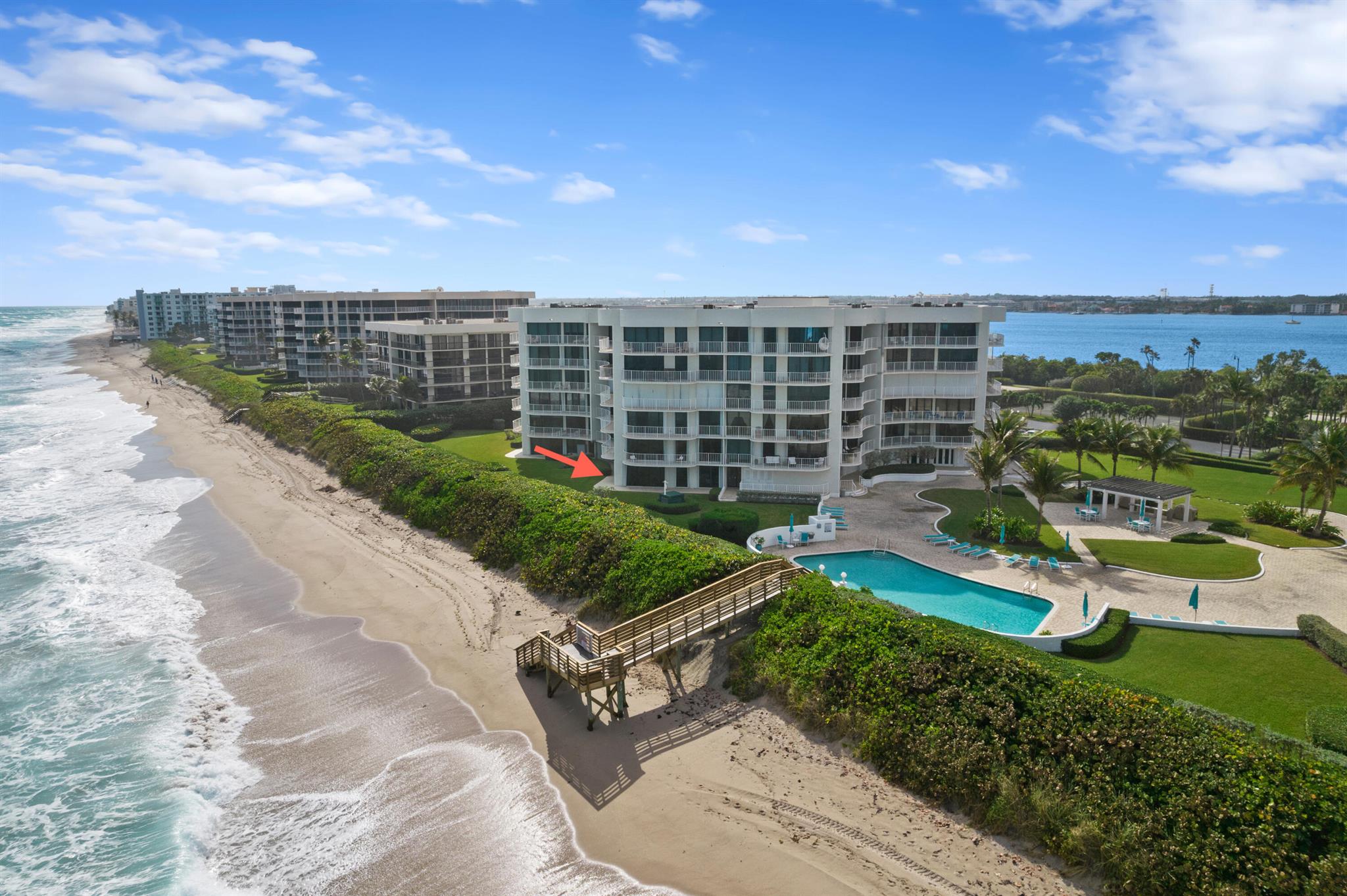 A rare opportunity to own a brand-new, direct oceanfront residence at the exclusive Thirty Three Sixty South Ocean. This large 3-bedroom home has been fully gutted and completely renovated, showcasing high-end, modern finishes throughout. Never lived in and move-in ready for the winter season!The bright and airy interior features sleek recessed lighting, impact-rated windows, and a clean, contemporary design. All three bedrooms open to a wraparound terrace that stretches the entire length of the home, with lush garden views and direct access to the beach just outside your door. Framed by classic Palm Beach hedges, the outdoor space offers privacy and the feeling of your own backyard oasis.