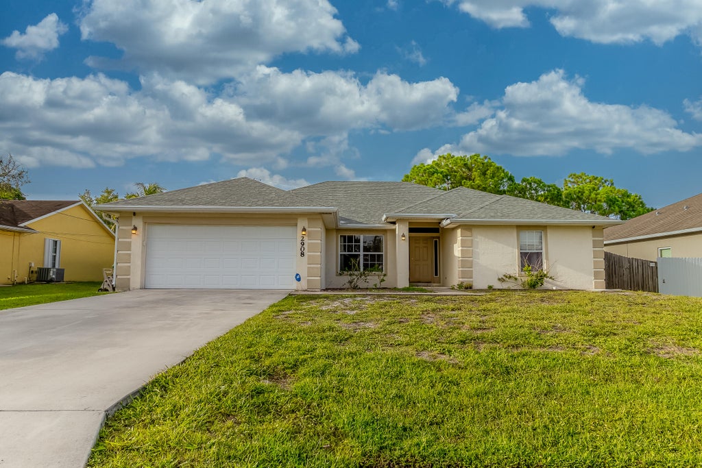 Photo of 2908 SW Romano Road, Port Saint Lucie, FL 34953 (MLS # R11002930)