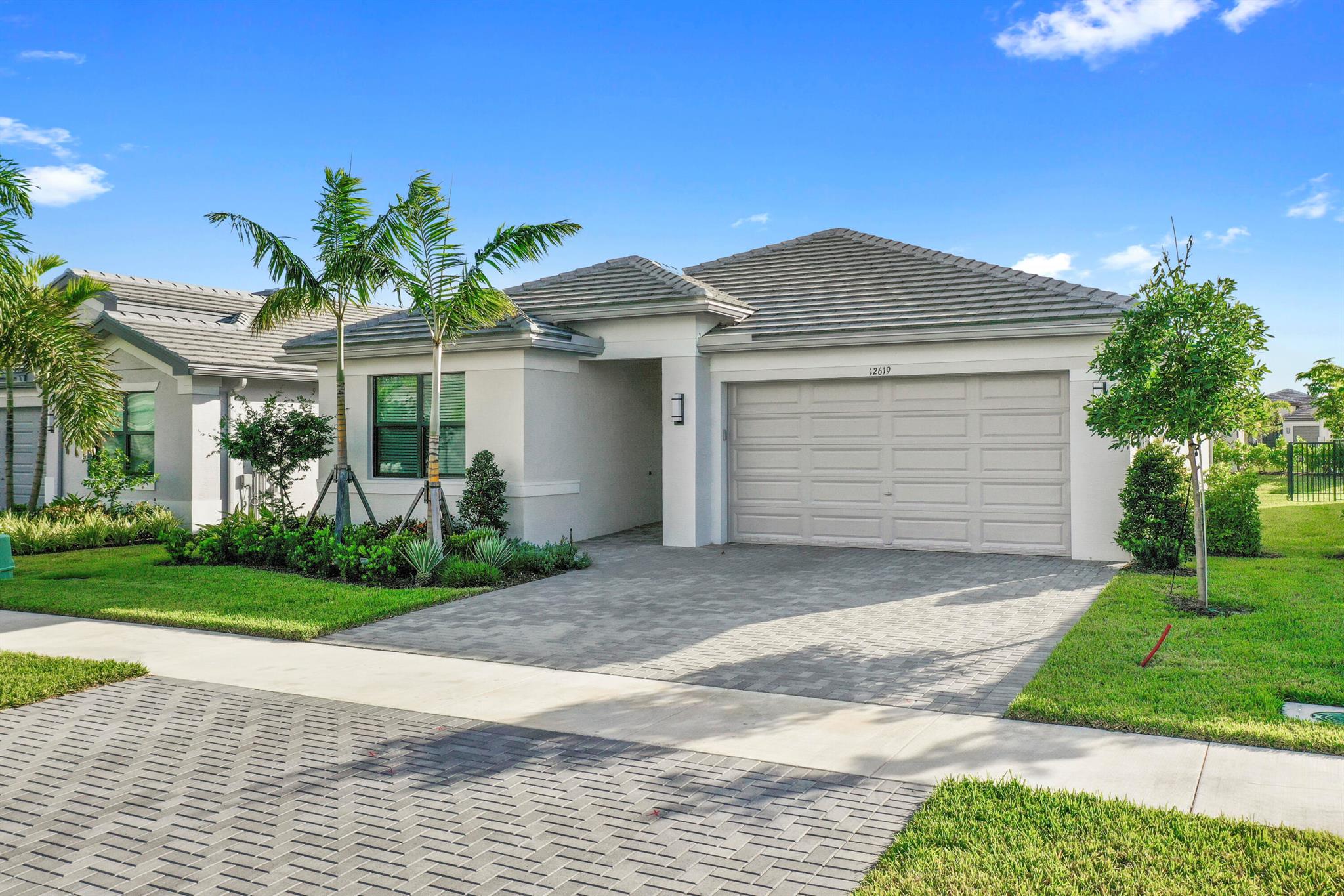 Welcome to your dream home in the desirable Valencia Walk at Riverland, an exceptional 55+ active community. Discover this beautiful Sandpiper model featuring 2 bedrooms, 2 baths, Den/Optional 3rd bedroom. 2 car garage and 1,752 sq ft of living areaEnjoy upgraded amenities including outdoor lighting, the primary bathroom showcases elegant shower tiles extending to the ceiling, while the den and master closets includes pocket door. The kitchen is enhanced with an upgraded pantry, vent microwave to exterior, granite countertop, freestanding laundry sink in laundry area. Upgraded tile flooring throughout no carpet. Widen entry driveway and extended pavers for covered patio. $5k Seller concessions toward Buyers closing costs.