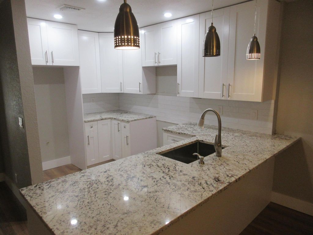 Photo of 401 W Cypress Way, Palm Springs, FL 33406 (MLS # R11133829)