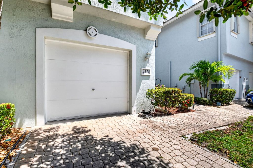Photo of 3271 Laurel Ridge Circle, Riviera Beach, FL 33404 (MLS # B26025661)