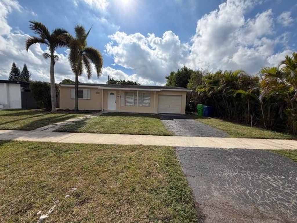 Photo of 8660 NW 26th Place, Sunrise, FL 33322 (MLS # F10540390)
